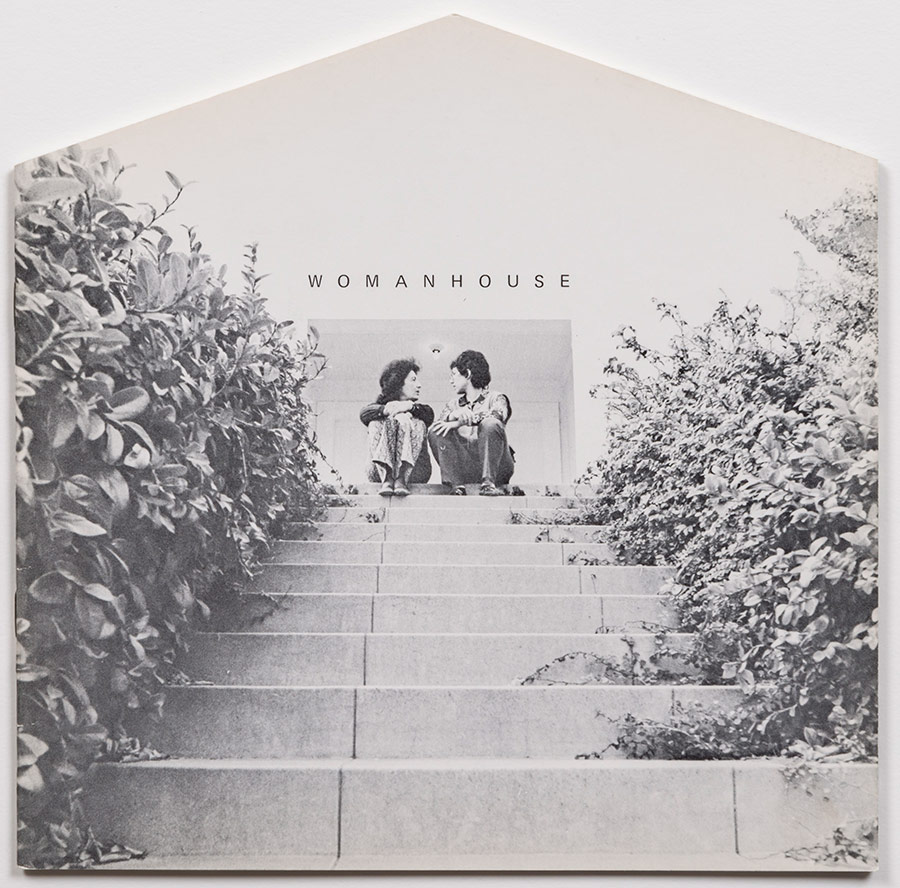 Womanhouse (January 30 – February 28, 1972)  organized by Judy Chicago and Miriam Schapiro, co-founders of the California Institute of the Arts (CalArts) Feminist Art Program. PIctured here, cover of the original exhibition catalog designed by Sheila de Bretteville.