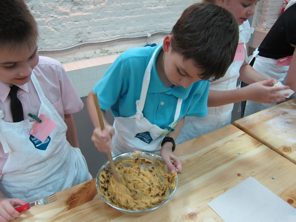 Two kids cooking