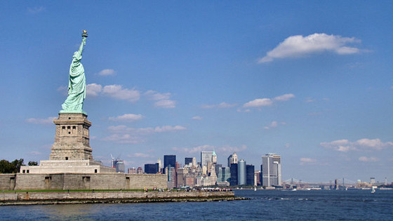 Statue with Manhattan in the background