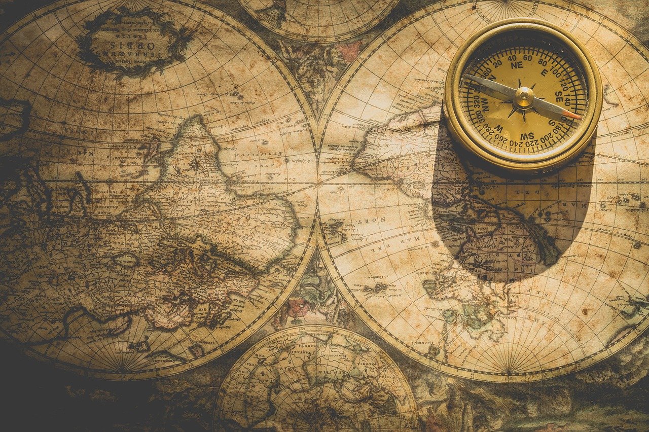 Mapamundi Mapa mundial con una brújula