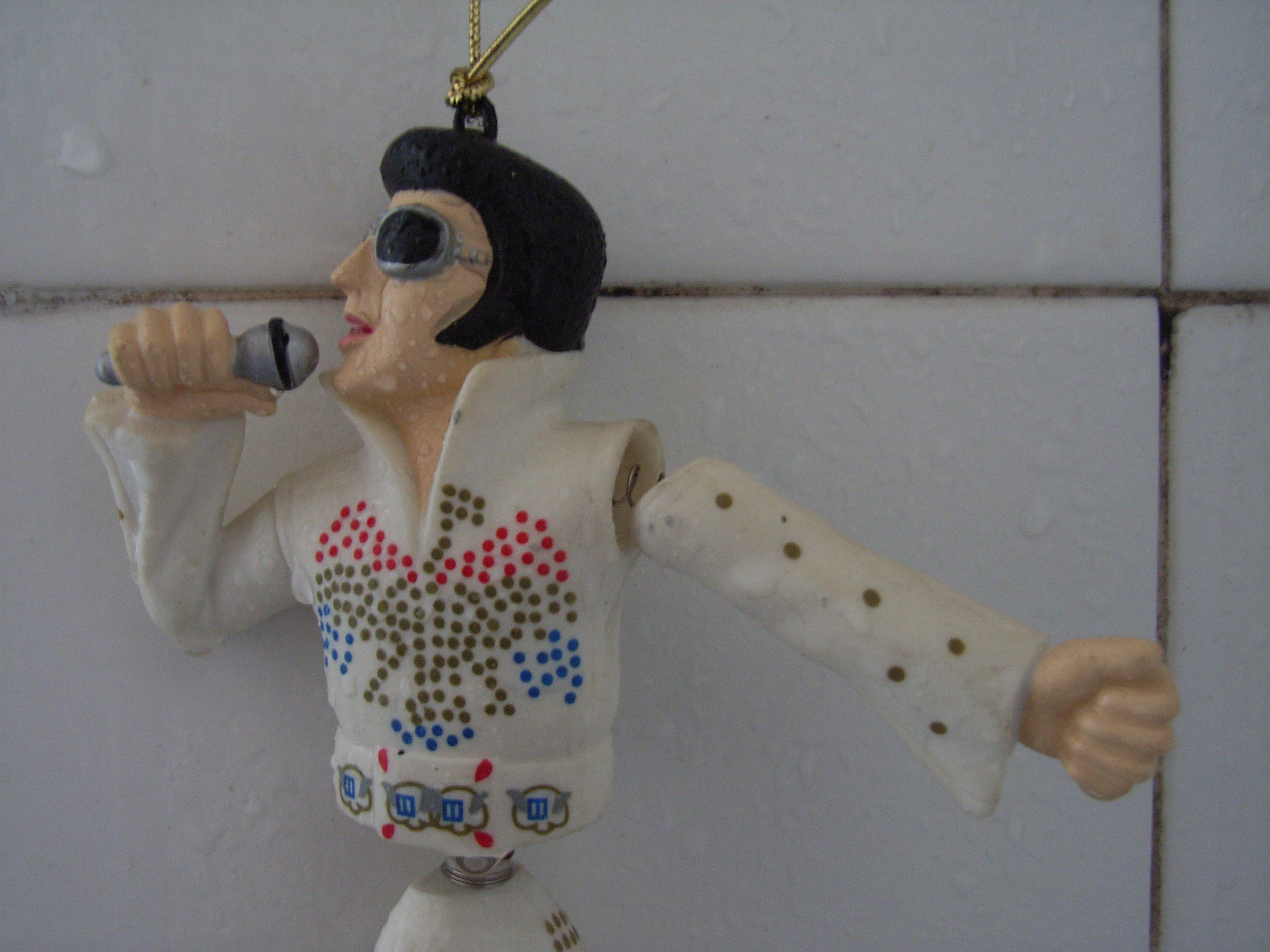 Cantar en la ducha Muñeco de Elvis Presley cantando en la ducha