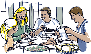 Familia cenando con alegría